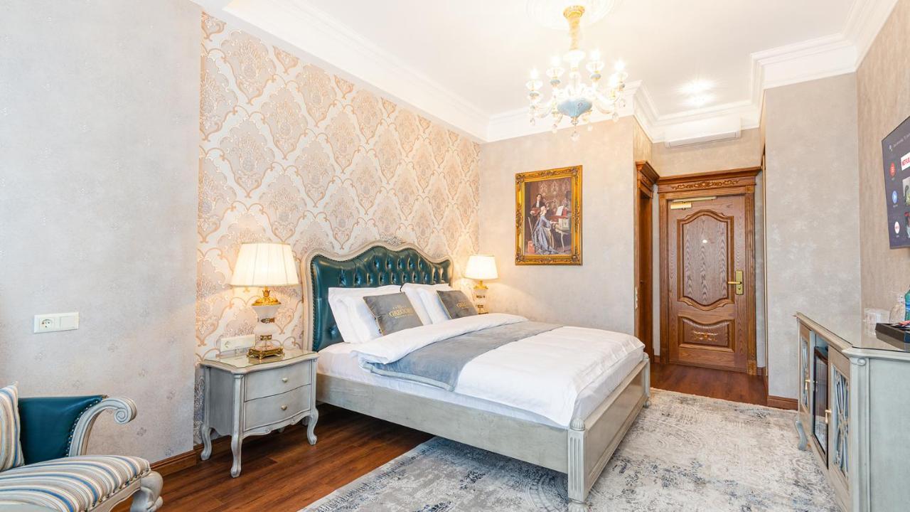 Gregory Boutique Hotel تشيسيناو المظهر الخارجي الصورة A bedroom